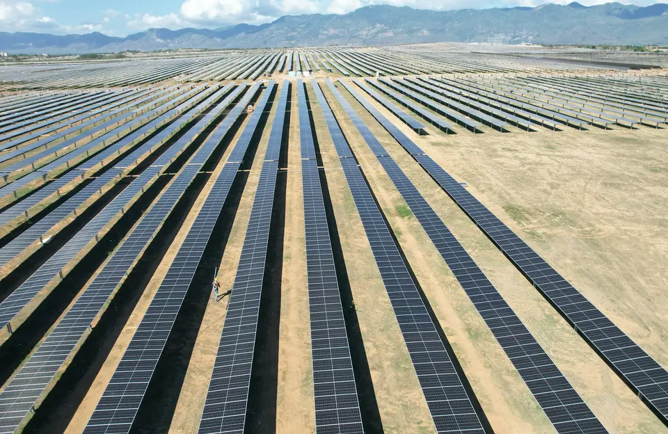 Saudi infrastructure across a solar landscape